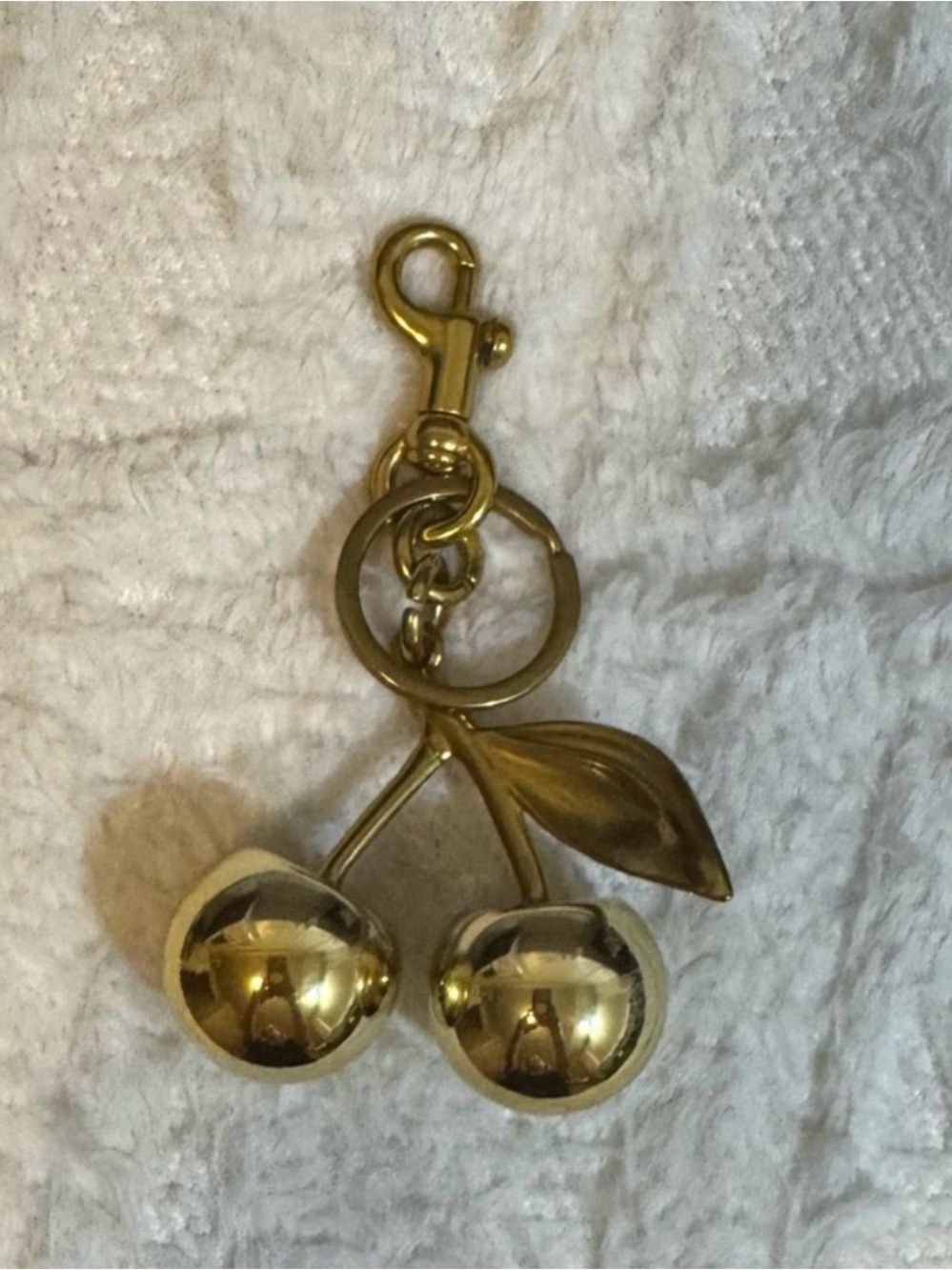 Gold cherry mirror bag charm